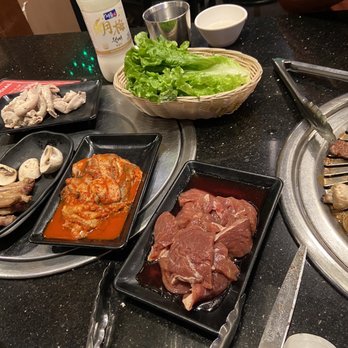 Jong Ga House - Spicy squid, short rib, lettuce wrap, intestines in the back - Korean Near Me - Oakland, California