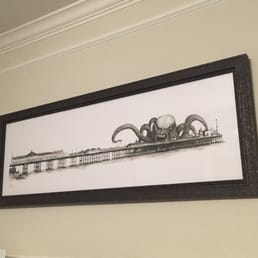 Art from Brighton, UK with frame made to look like worn steel/ship or dock rivets to go with the nautical theme. Art from Brighton, UK with frame made to look like worn steel/ship or dock rivets to go with the nautical theme.