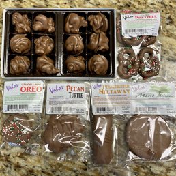 Raisin clusters and several other chocolates Raisin clusters and several other chocolates