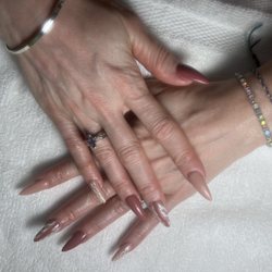 Multiple nude color gel nail design with detail and glitter