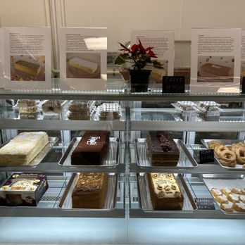 Eurasia Market - Cakes. Signs above each describing them. - Grocery Near Me - Columbus, Ohio