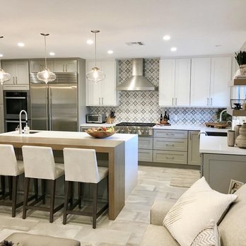 Koda Interiors - Wood kitchen island with two toned cabinets. - Interior Design Near Me