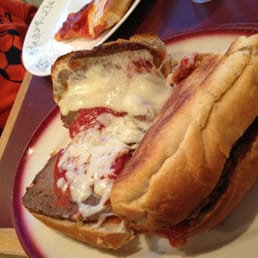 "Meatball grinder". Looked like freezer burnt meatloaf. "Meatball grinder". Looked like freezer burnt meatloaf.