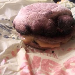 a hamburger on a wrapper a hamburger on a wrapper