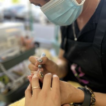 Demure Nails & Spa - Ben doing what he does best! - Nail Salons Near Me - Orange, California