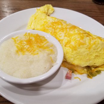 Frizzle Chicken Cafe - Western omelet and cheese grits - Breakfast & Brunch Near Me - Pigeon Forge, Tennessee Frizzle Chicken Cafe - Western omelet and cheese grits - Breakfast & Brunch Near Me - Pigeon Forge, Tennessee