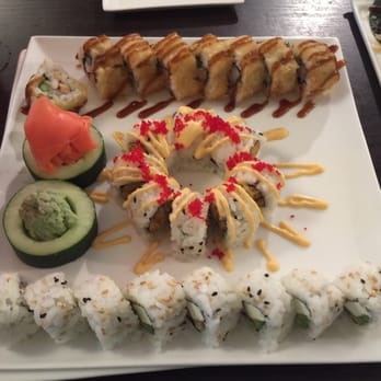 Yama Sushi & Bento - Sushi, including the Louisiana roll in the center. - Sushi Bars Near Me - Middleburg, Florida Yama Sushi & Bento - Sushi, including the Louisiana roll in the center. - Sushi Bars Near Me - Middleburg, Florida