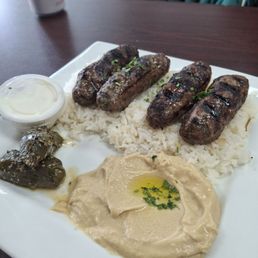Kefta platter with hummus and grape leaves Kefta platter with hummus and grape leaves
