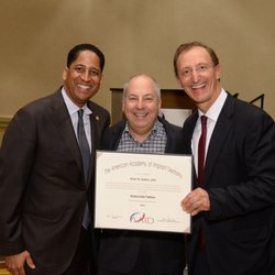 Advanced DDS - Dr. Brian Raskin, receiving his Associate Fellowship from the American Academy of IMplant Dentistry Conference (2014)