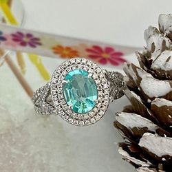 Bradley's Jewelers - Keep that New Year glow all year long... with exotic vibrant Paraiba Tourmaline and Diamonds! Color outside the lines... at Bradley's!