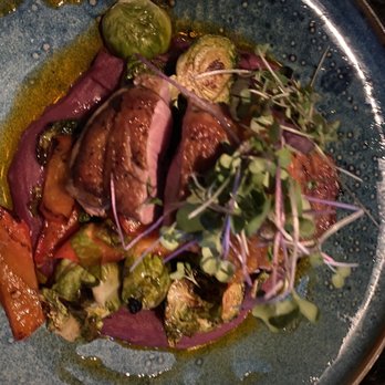 The Bellwether - Duck Breast with Brussels sprouts over a bed of a fruit purée - Cocktail Bars Near Me - St. Louis, Missouri The Bellwether - Duck Breast with Brussels sprouts over a bed of a fruit purée - Cocktail Bars Near Me - St. Louis, Missouri
