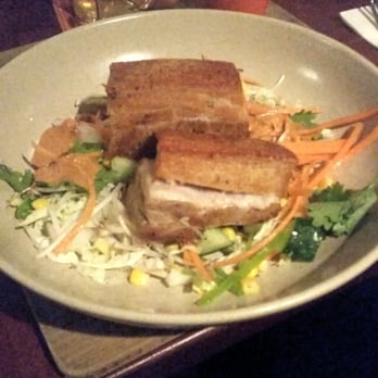 Noosa Boathouse - Chefs signsture dish: slow cooked pork belly, thai red curry, asian vegetables, pickled cucumber & mango $33 - Venues & Event Spaces Near Me - Noosaville, QLD