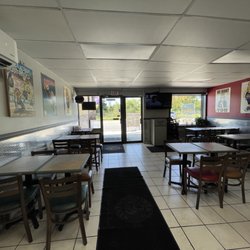 Cluck U - Looks different than the last time I was here and chairs were stacked up in a corner. Tables are out again. (9.18.22)