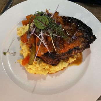 Ford + Shep - Pork chop with grits - Cocktail Bars Near Me - Greenville, North Carolina Ford + Shep - Pork chop with grits - Cocktail Bars Near Me - Greenville, North Carolina