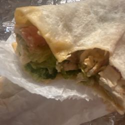 Arianna's Restaurant & Pizzeria - This is no hot sauce on a buffalo chicken wrap very clearly said no hot sauce. It's soaked in hot sauce.
