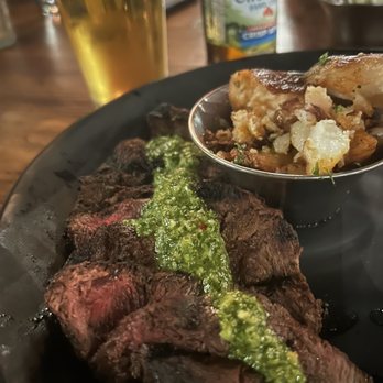 Whiskey 'N Rye Smokehouse - Flat iron steak with chimichuri sauce and garlic smashed potatoes - both were amazing! - Barbeque Near Me - Solvang, California Whiskey 'N Rye Smokehouse - Flat iron steak with chimichuri sauce and garlic smashed potatoes - both were amazing! - Barbeque Near Me - Solvang, California