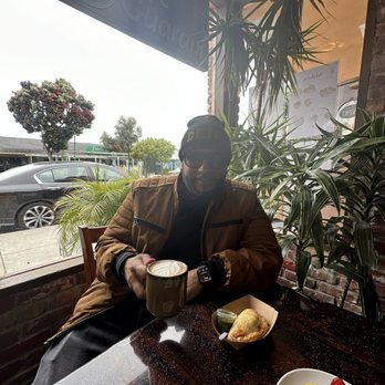 Cafe Guarani - cappuccino and beef empanada - Cafes Near Me - Pacific Grove, California