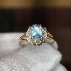 McCrory's Jewelry and Repair - Blue Topaz and Diamond Ring