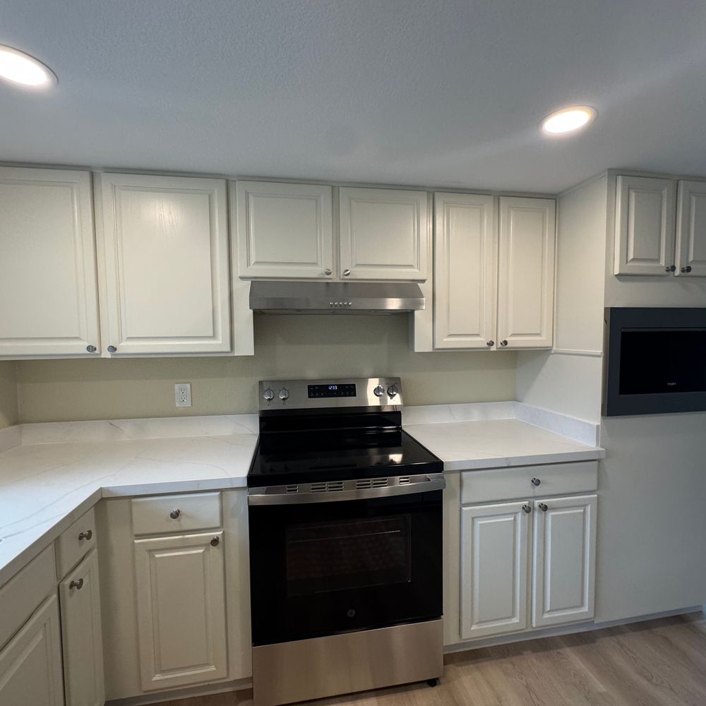 Qc residential remodeling - New kitchen counters and painted kitchen cabinets - General Contractors Near Me Qc residential remodeling - New kitchen counters and painted kitchen cabinets - General Contractors Near Me