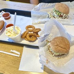 Daisy Family Fast-Food Restaurant - The Daisy burger with cheese, the double Daisy burger with cheese, mozzarella sticks, homemade coleslaw, and onion rings. Delicious!!
