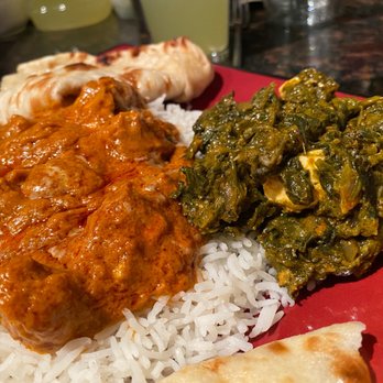 Haveli Bistro - Tiki Marsala, Saag Paneer and Naan bread plated and ready to eat. - Indian Near Me - Columbus, Ohio