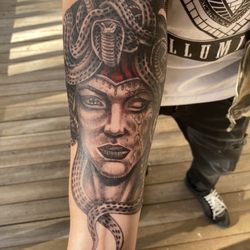 A Clockwork Tattoo and Art Gallery - Tattoo