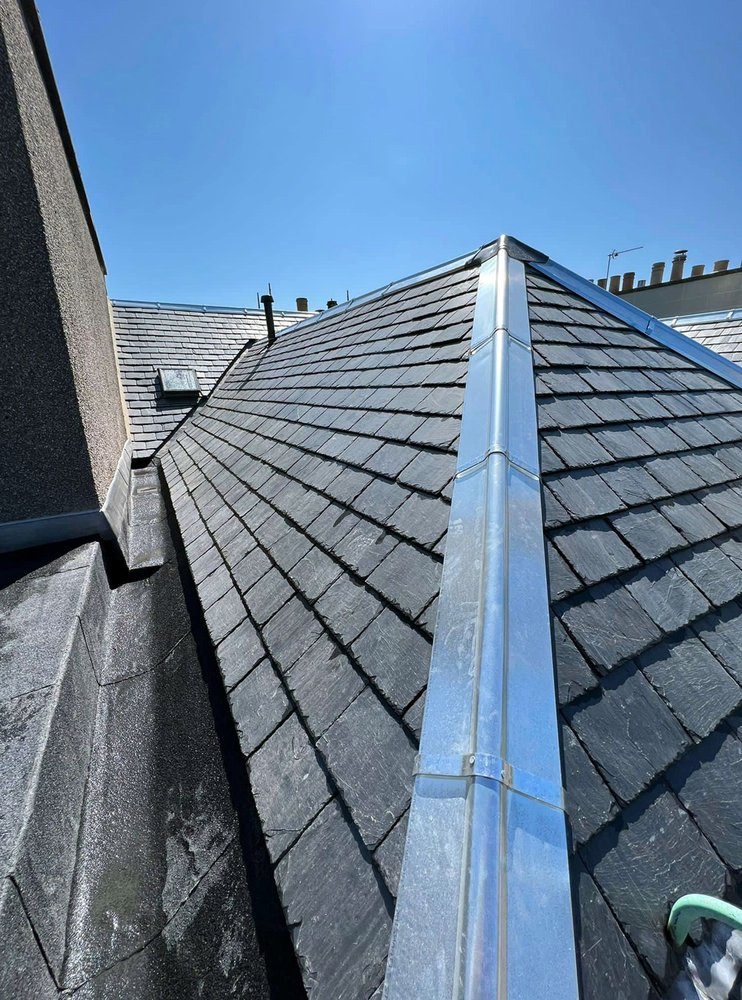 Slide of Quail Hill Roofing