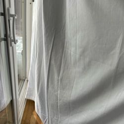 Alro Custom Drapery Installation - Alro couldn't even be bothered to steam the curtains before hanging.  "That's just how it is" they say.