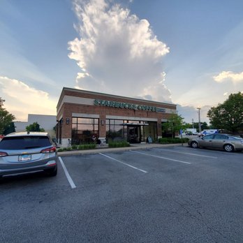 Starbucks - a parking lot with cars parked in front of it - Coffee & Tea Near Me - St. Louis, Missouri Starbucks - a parking lot with cars parked in front of it - Coffee & Tea Near Me - St. Louis, Missouri