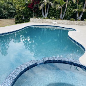 LUX Pool Services - Renovated pool with Aqua Blue mini pebble. - Pool Cleaners Near Me