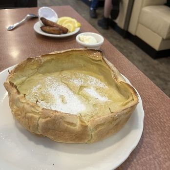 The Original Pancake House - Dutch baby w/ lemon butter. Syrup not necessary as I add fruit & lemon!! Kind of a twist of crepes & custard. It's a distinct texture. - Scandinavian Near Me - Austin, Texas The Original Pancake House - Dutch baby w/ lemon butter. Syrup not necessary as I add fruit & lemon!! Kind of a twist of crepes & custard. It's a distinct texture. - Scandinavian Near Me - Austin, Texas
