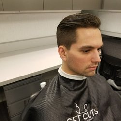 Classy but yet trendy side part pushed over to the side.