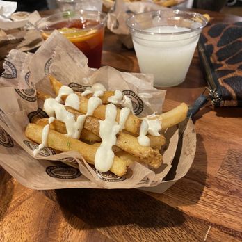 The Fat Shallot -Evanston - a basket of fries with sauce - Sandwiches Near Me - Evanston, Illinois The Fat Shallot -Evanston - a basket of fries with sauce - Sandwiches Near Me - Evanston, Illinois