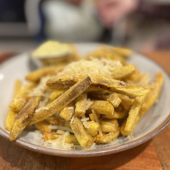 Kwizinn Vieux-Montréal - a plate of french fries - Caribbean Near Me - Montreal, Quebec