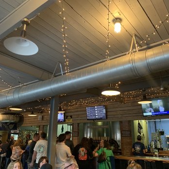 Eleventh Hour Brewing - a large group of people sitting at tables - Breweries Near Me - Pittsburgh, Pennsylvania
