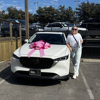 Roger Beasley Mazda South - 2022 Mazda CX-5 Premium Package AWD. The cutest touch adding the pink bow so I could take a photo! :) - Auto Repair Near Me - Austin, Texas