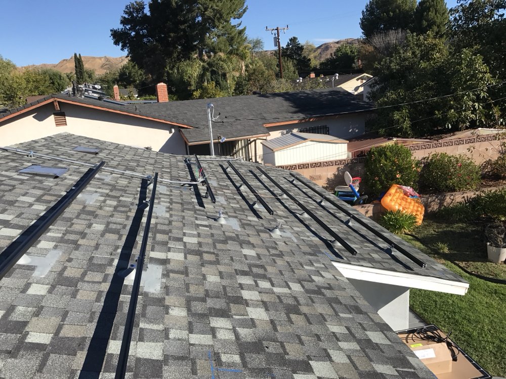 Slide of Espino Roofing