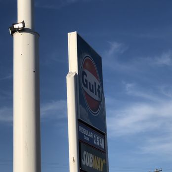 Fat dogs - a gas station sign and a gas station - Convenience Stores Near Me - Ogallala, Nebraska