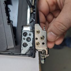 Tech Sales & Repairs - Seized hinges resulted in broken palm rest assembly. Repaired seized hinge and replaced palm rest assembly. Saved client from spending more.