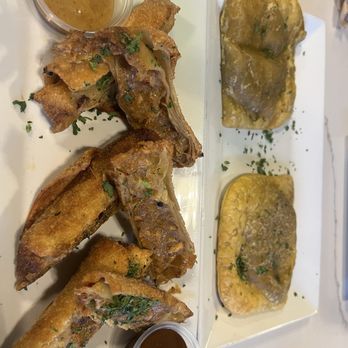 Caribbean Jerk Palace - Jerk salmon egg rolls and curry chicken patty - Caribbean Near Me - Houston, Texas Caribbean Jerk Palace - Jerk salmon egg rolls and curry chicken patty - Caribbean Near Me - Houston, Texas