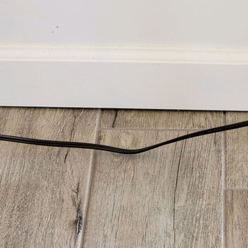Kodiak Tile and Stone - Baseboard won't go to tile, floor uneven. - Flooring Near Me