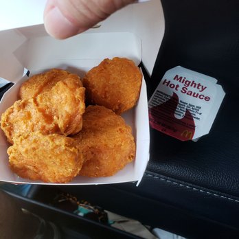 McDonald's - a person holding a container of fried food - Fast Food Near Me - Boynton Beach, Florida McDonald's - a person holding a container of fried food - Fast Food Near Me - Boynton Beach, Florida