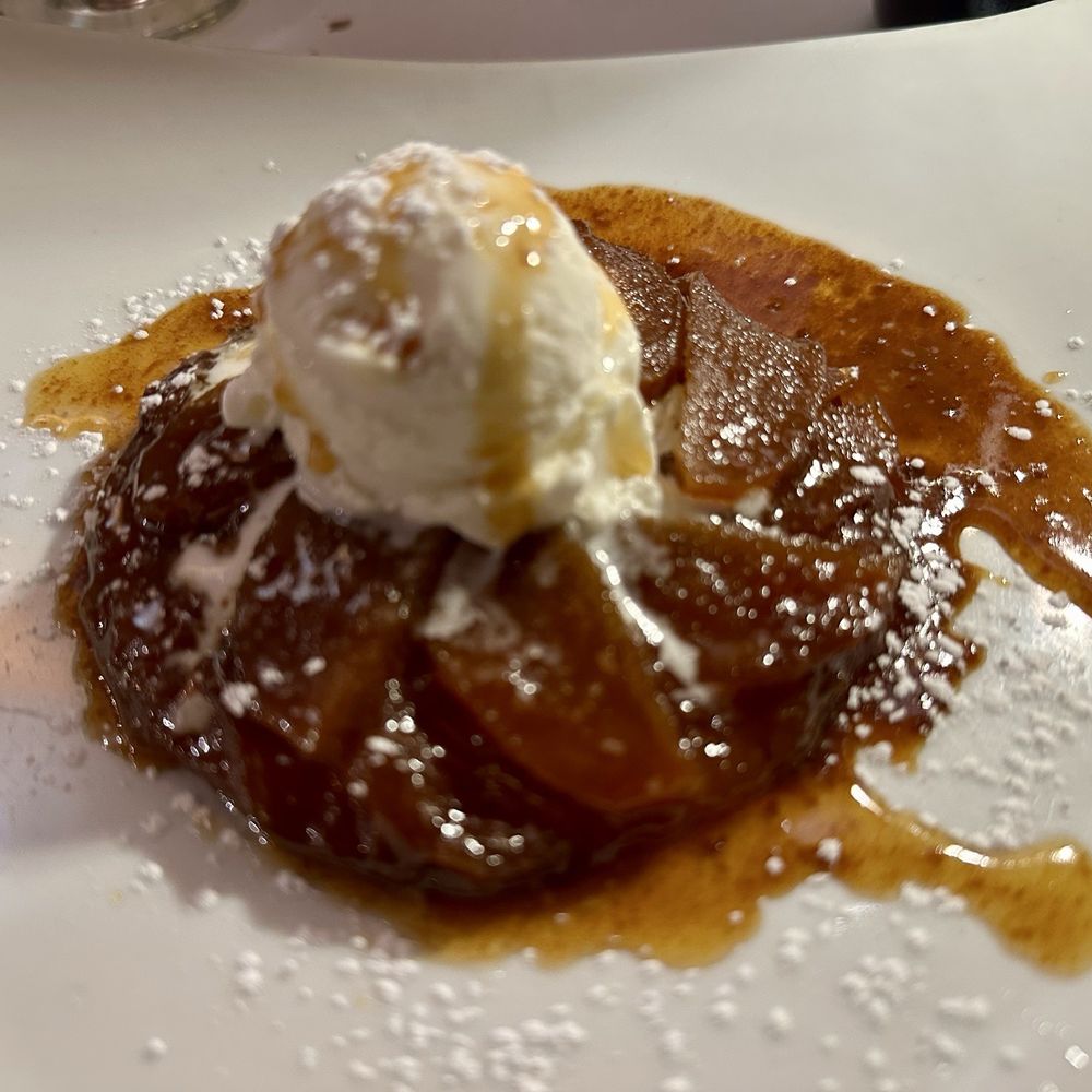 Cafe Monet - Caramelized apple tart tatin - French Near Me - Millburn, New Jersey Cafe Monet - Caramelized apple tart tatin - French Near Me - Millburn, New Jersey