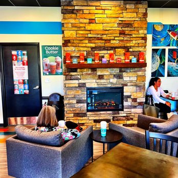 Biggby Coffee - Indoor seating space with fireplace - Coffee & Tea Near Me - Raleigh, North Carolina