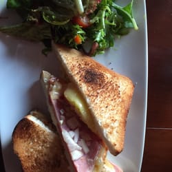 Riverbank House Restaurant - Ham and Swiss sandwich comes with side salad and chips.