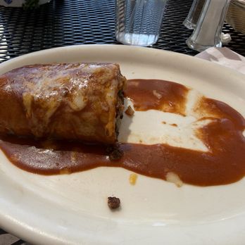 Pueblo Viejo Grill - 1/2 of steak burrito filled - Mexican Near Me - Palm Desert, California Pueblo Viejo Grill - 1/2 of steak burrito filled - Mexican Near Me - Palm Desert, California