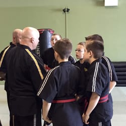 Kirk's Martial Arts & Krav Maga - Mr. Ernie getting the black belt candidates pumped up before the final potion of their test!