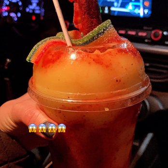 Mr. Tutis Fruties - a person holding a drink - Juice Bars & Smoothies Near Me - Florida City, Florida Mr. Tutis Fruties - a person holding a drink - Juice Bars & Smoothies Near Me - Florida City, Florida