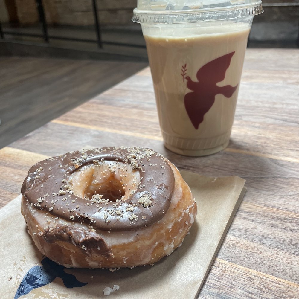 La Colombe Coffee - Oatmilk draft and chocolate donut - Coffee & Tea Near Me - Philadelphia, Pennsylvania