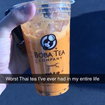 Boba Tea Company - A cup full of ice with some orange-dyed milk added. - Bubble Tea Near Me - Scottsdale, Arizona